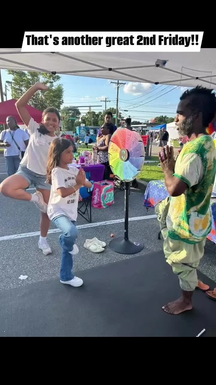 Children and families at an outdoor community street event
